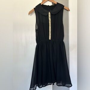 Kld Signature Black Flounce Dress w/ Peter Pan Collar & Metal Embellishment Sz S